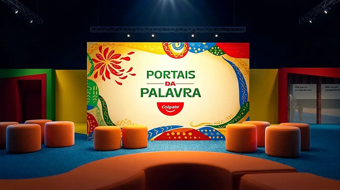 Render do palco com a marca Portais da Palavra e pufes laranja