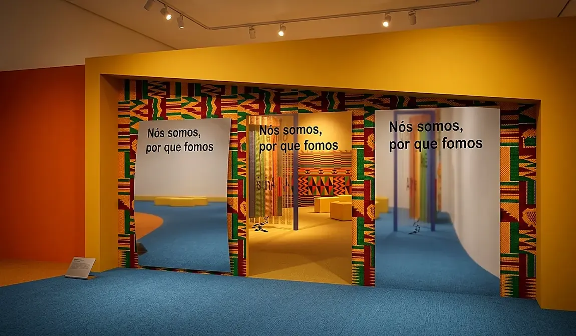 Render dos portais em Kente com a frase Nós somos, por que fomos